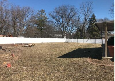 a white pvc fence