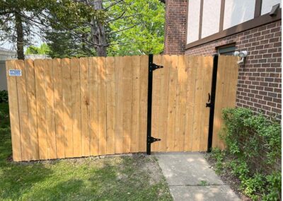 a cedar wood fence gate