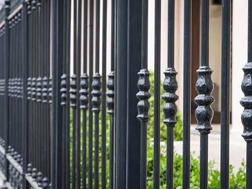 an ornamental steel fence SJ Fence built for a commercial fencing project